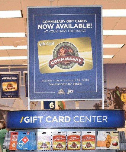 Commissary Gift Card poster at NEXCOM store.